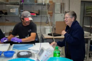 Rachel Levi laughing with a coworker at SELEE Corp.